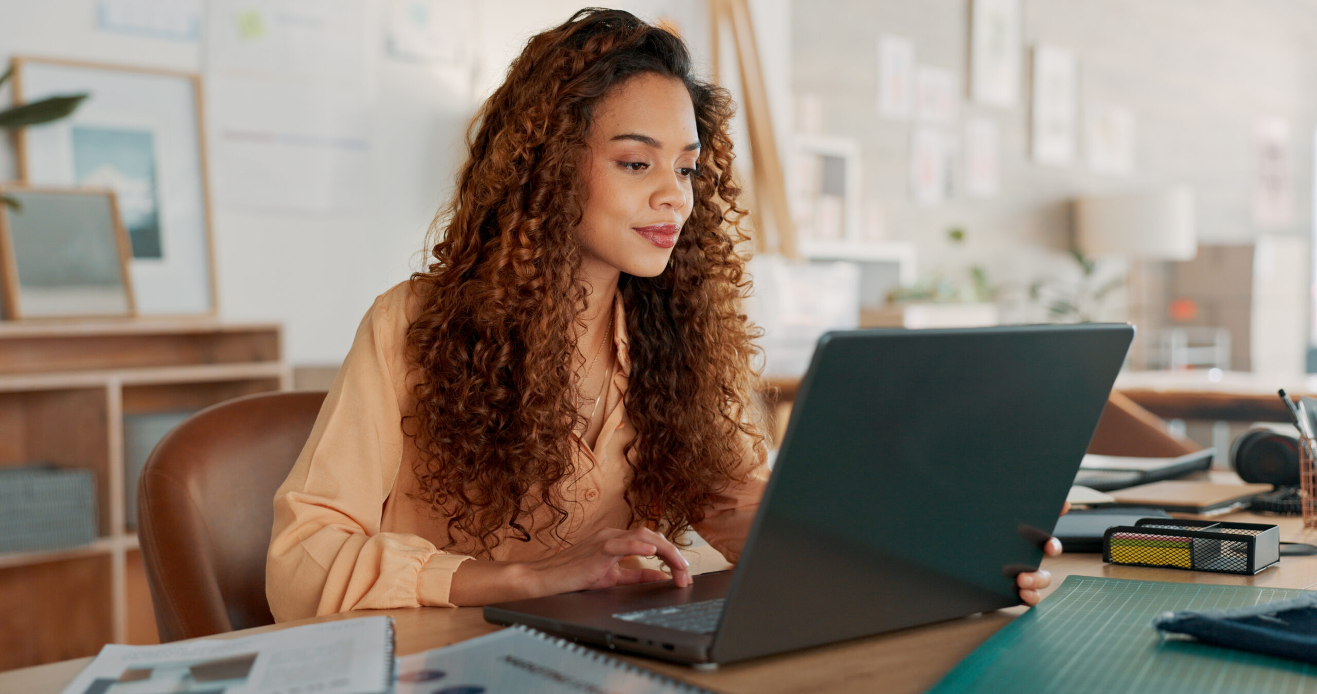 Black woman, documents or working on laptop planning, creative research or data analysis for marketing project management review. Business, typing corporate report, schedule or SEO calendar agenda