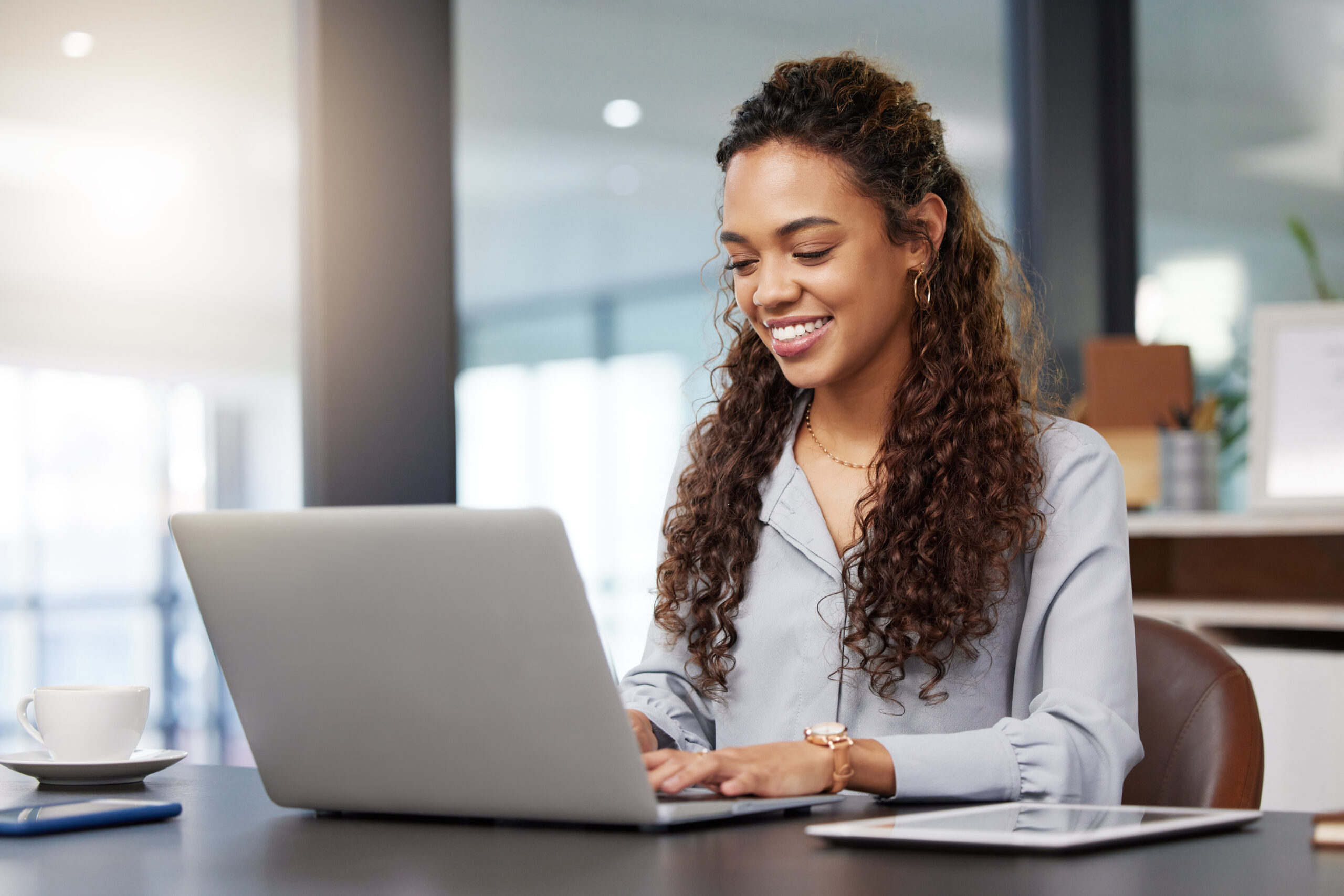 Happy, laptop and search with business woman in office for social media, networking and corporate. Smile, planning and technology with employee in digital agency for entrepreneur, internet and email.